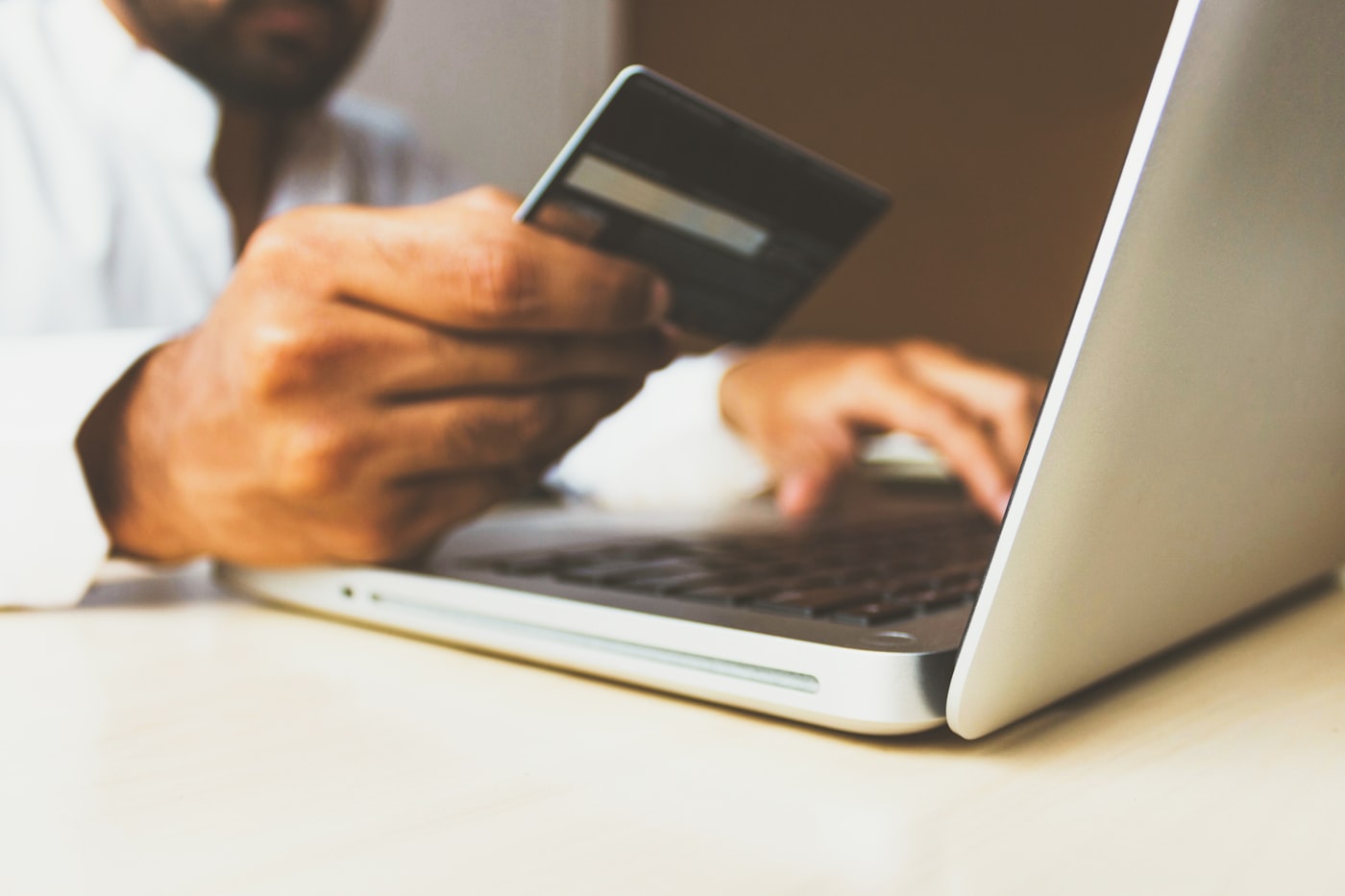 Person using a payment card at a terminal
